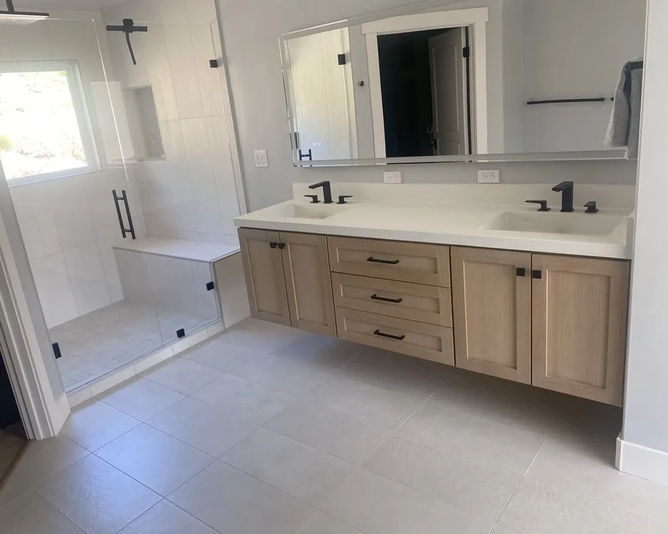 Bathroom renovation with wood vanity
